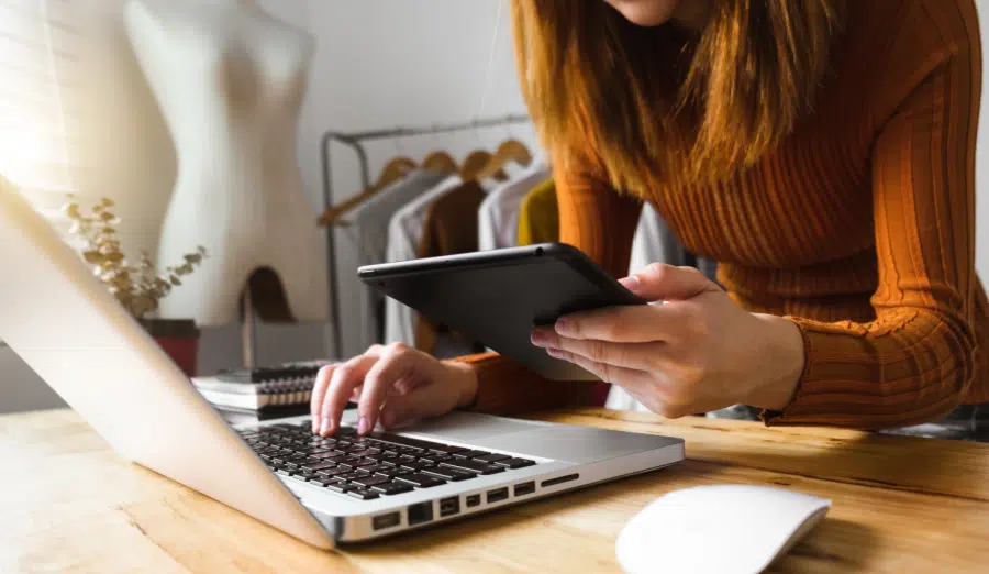 Best Registered Agent Services Best Registered Agent Services. Woman searching online with a laptop for the best registered agent services.