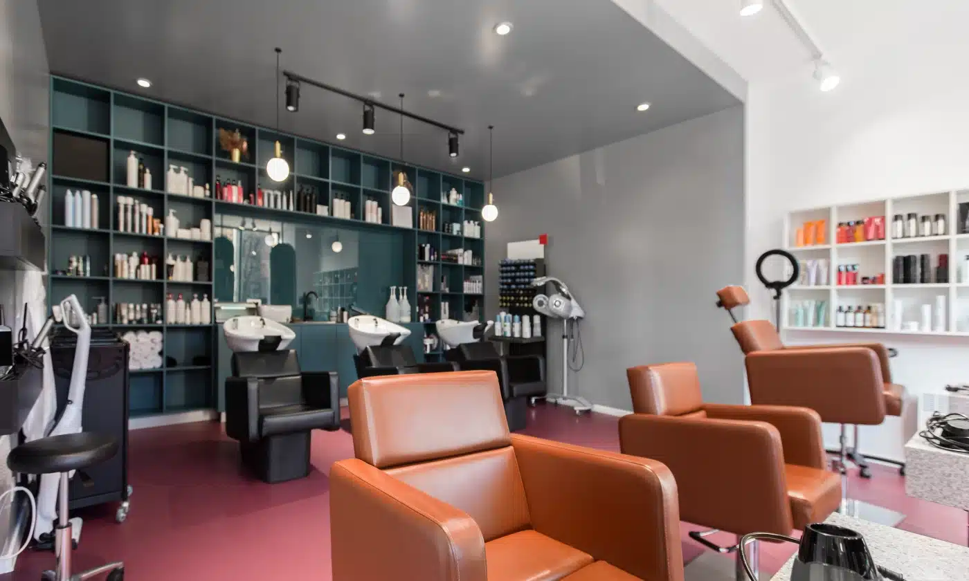 Hair Salon Interior. Inside view of a hair salon with chairs and hairdressing equipment