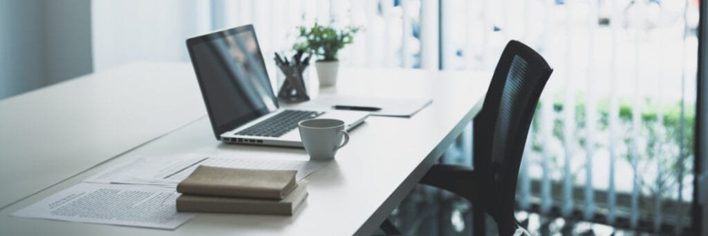 Ltd vs LLC, an image of a desk with a laptop