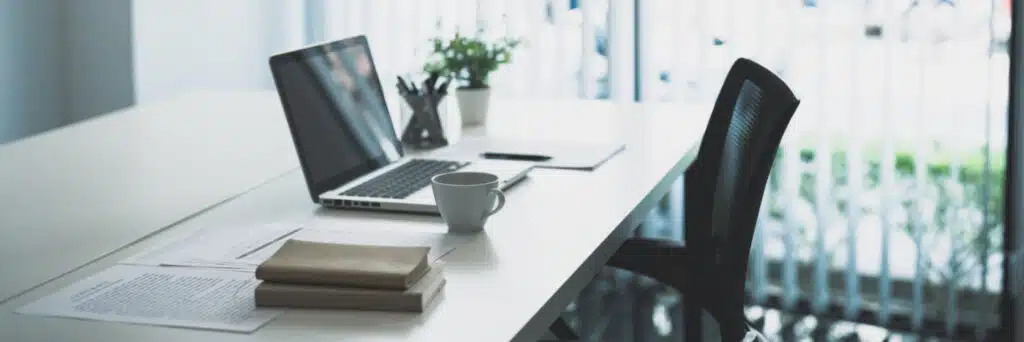 Ltd vs LLC, an image of a desk with a laptop