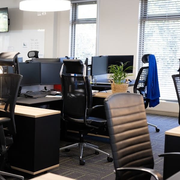 Statutory Agent office with desks, computers and chairs